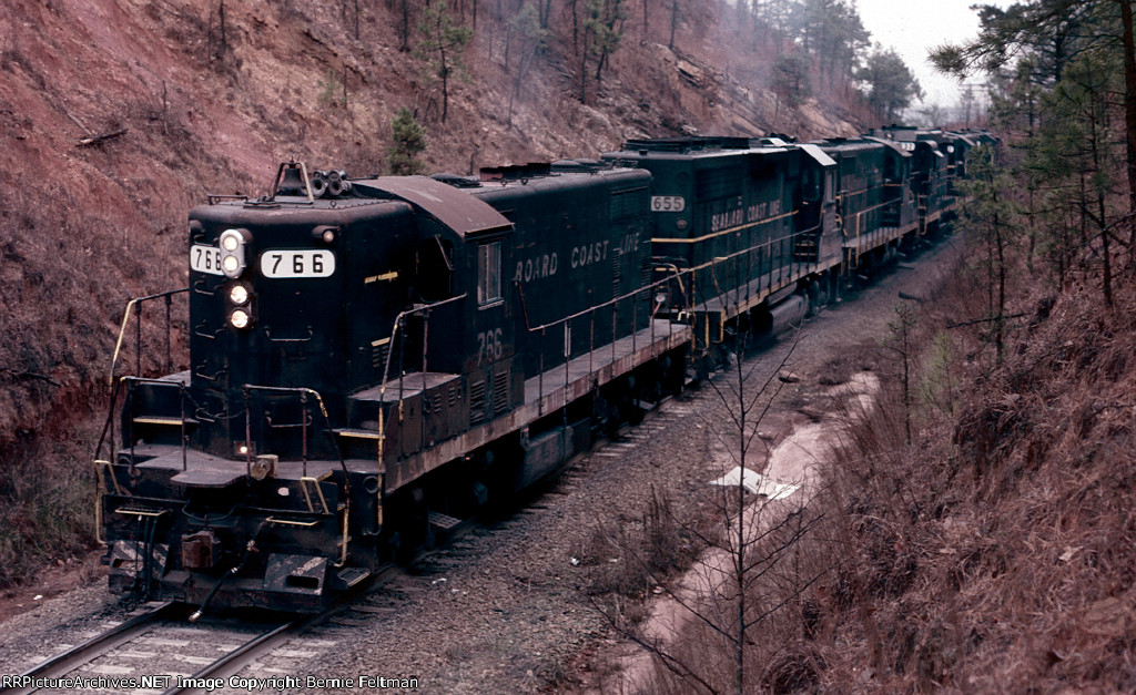 Seaboard Coast Line GP7 #766 is leading train #507 up the grade leaving the yard southbound 